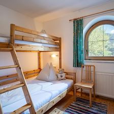 Schlafzimmer Parterre (c) Hannes Dabernig